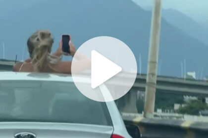 video:-mulher-faz-foto-no-teto-de-solar-de-carro-em-movimento-em-sc-e-e-surpreendida-por-guarda