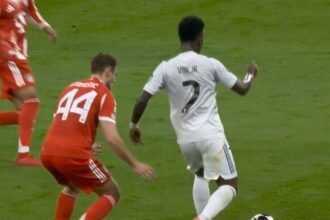 apoiado-por-virginia-no-bernabeu,-vini-jr.-erra-passe-e-bayern-abre-o-placar-contra-o-real